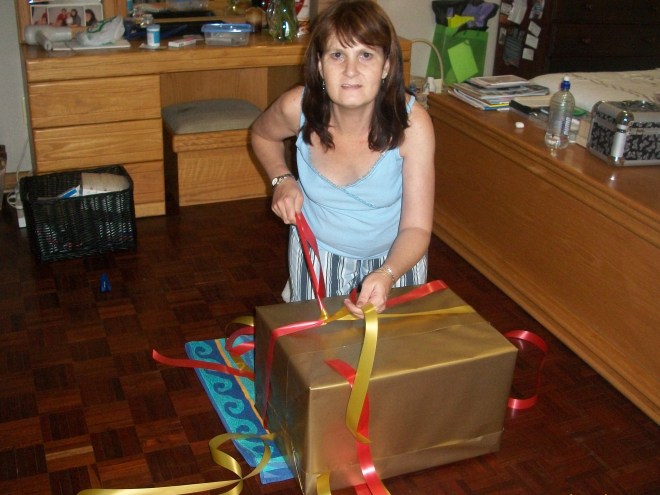 Vic wrapping Jon-Daniel's gift