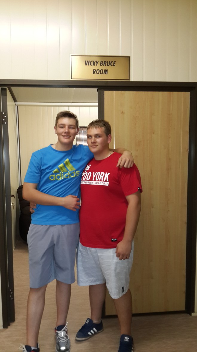 The boys outside the Vicky Bruce Dignity Room